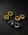 UNCLIPT Baguette ear cuff in Jade, Gold and Silver finishes on black slate, no piercing needed