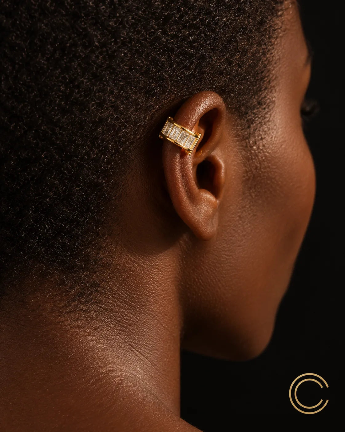 Gold Baguette ear cuff seen from behind the ear, showing how the cuff curves onto the cartilage