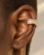 Gold Baguette ear cuff seen from behind the ear, showing how the cuff curves onto the cartilage.