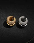 Pave dome ear cuff in gold and silver on black slate, no piercing needed, micro pave zirconia